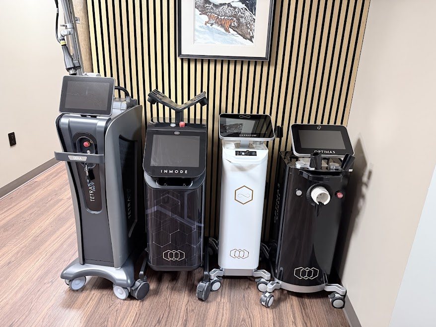 Refined's four treatment platforms lined up in the practice: the DEKA Tetra PRO, two InMode systems, and the Glacé platform